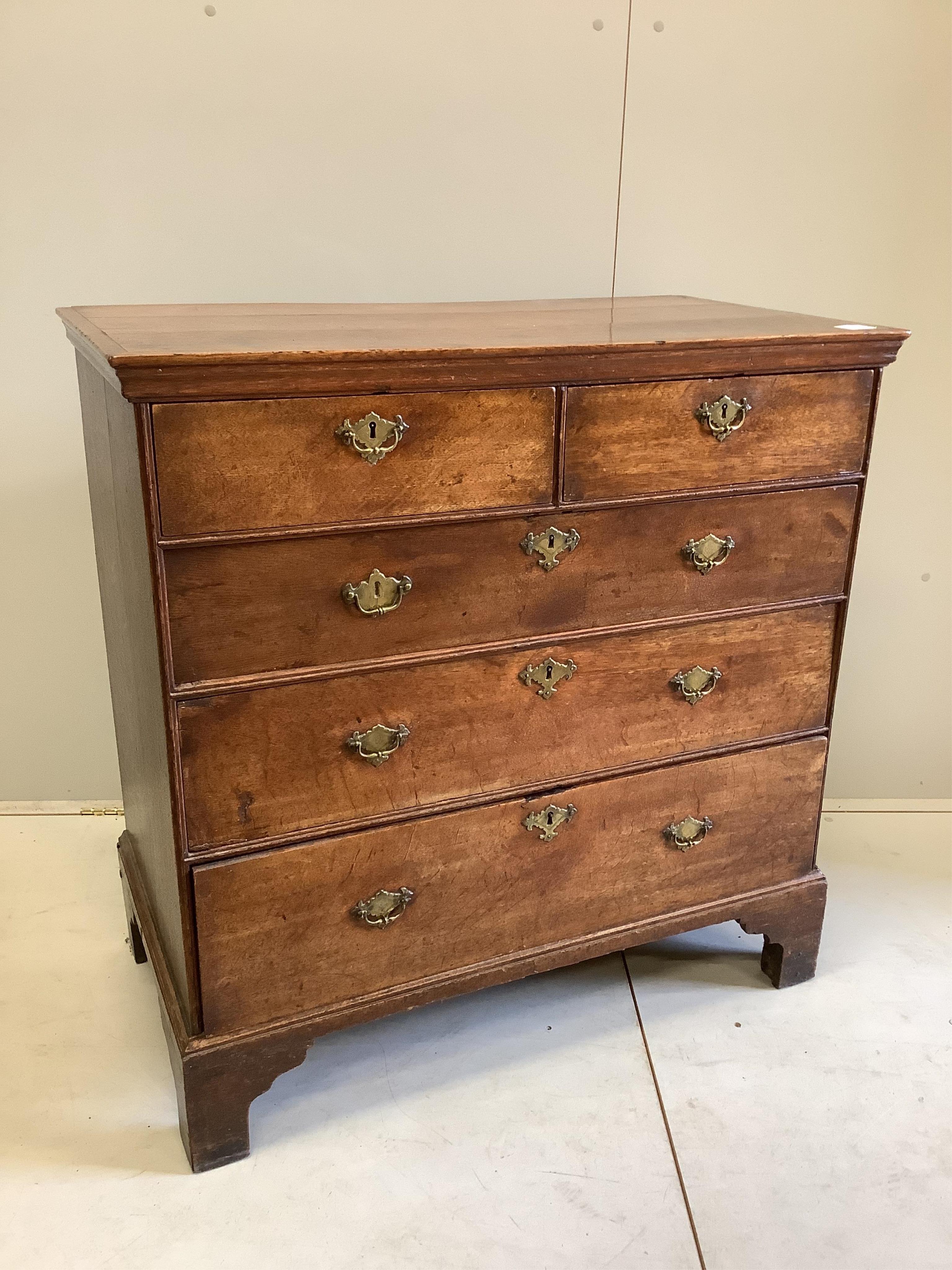 A mid 18th century oak chest, fitted with two short and three long drawers, width 93cm, depth 50cm, height 94cm. Condition - fair